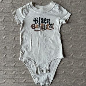 EUC Carter’s Unisex Short Sleeve Onesie, “Black is Beautiful,” 9 Months